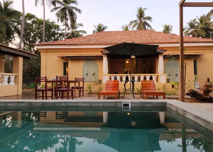 Caju Grove - The Big Yellow Goan House