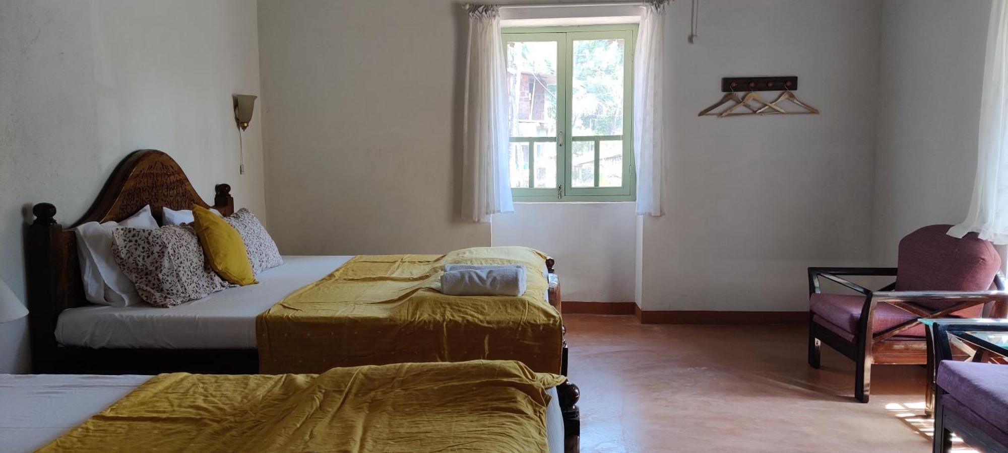 Caju Grove - The Big Yellow Goan House